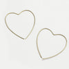 Gold heart-shaped hoop earrings, delicate design perfect for adding a playful touch to any outfit.