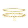 Set of two 14K gold-plated beaded bracelets for women with an initial charm. Adjustable and stylish for stacking.